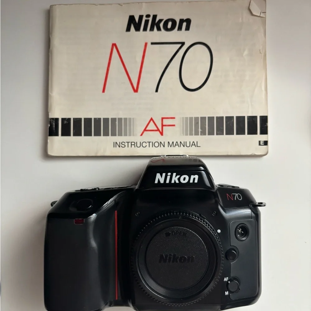 Nikon N70 SLR Camera Body with Branded Strap and Accessories